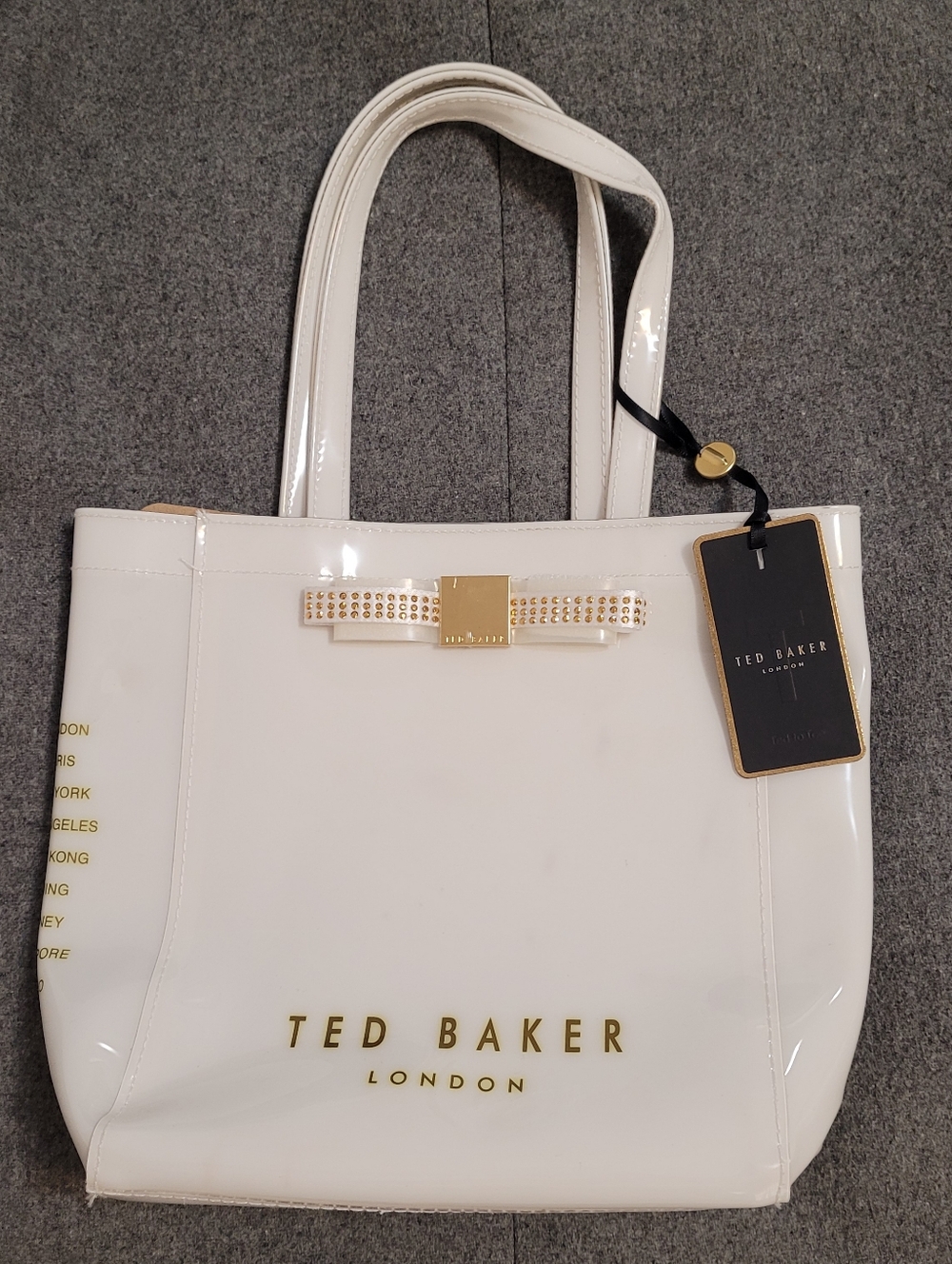 NWT Ted Baker White Patent Tote with Gold Bow Accent